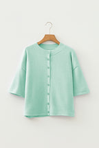 Dear-Lover Peach Blossom 3/4 Sleeve Boxy Knit Cardigan with button-down front, soft acrylic and polyester blend, lightweight sweater.