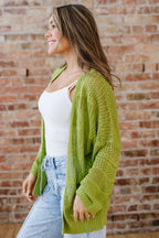 Spinach green oversized crochet knit open cardigan from Dear-Lover, soft acrylic sweater with a relaxed fit and open front design.