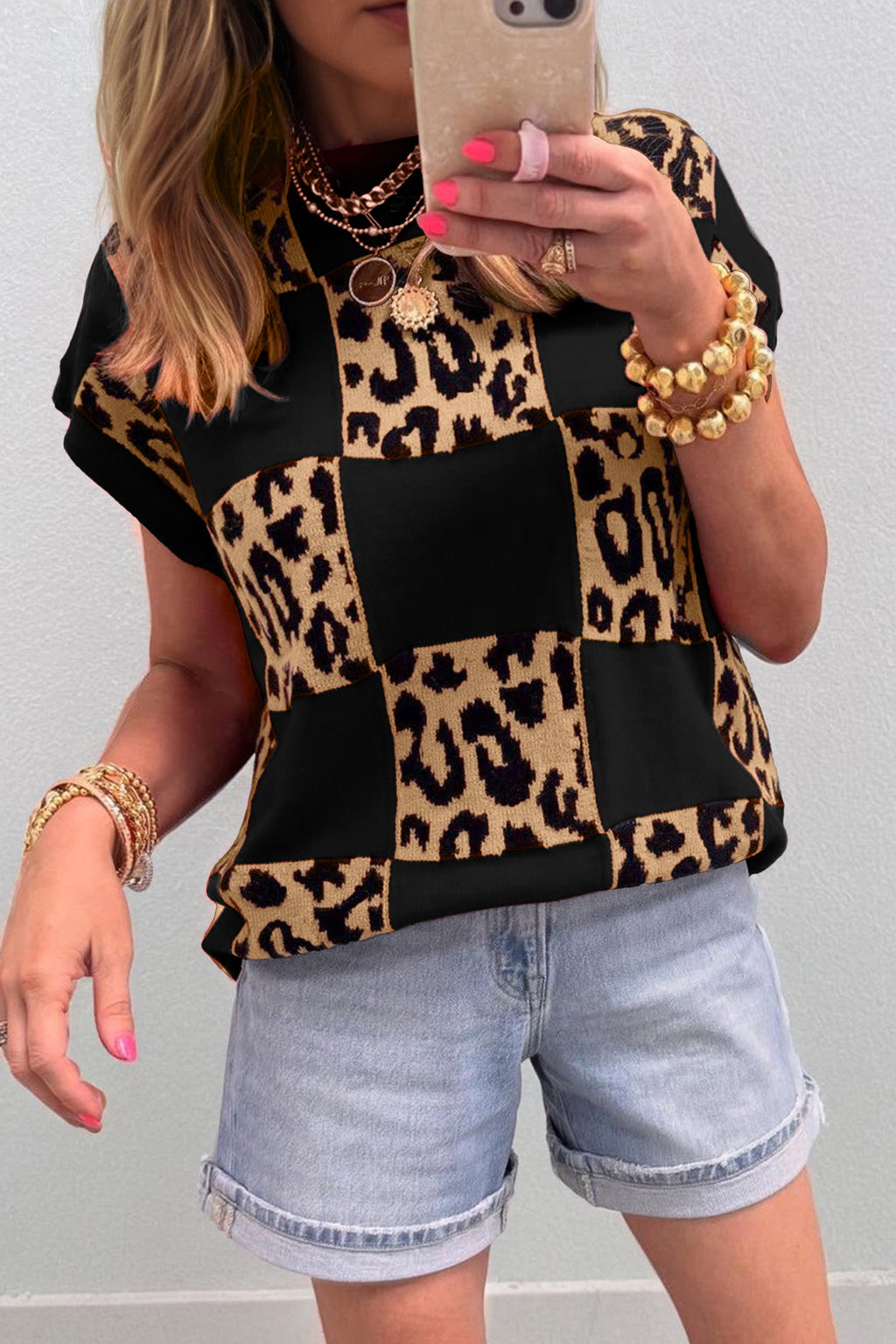 Black Leopard Checkerboard Short Sleeve Knit Sweater by Dear-Lover, featuring a bold pattern and comfortable short sleeves.