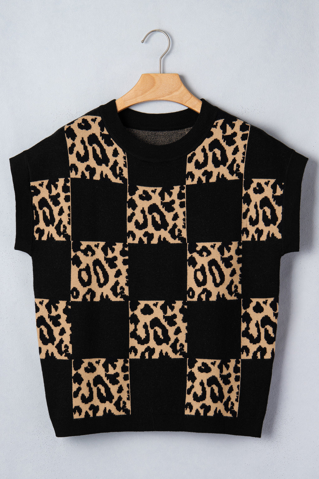 Black Leopard Checkerboard Short Sleeve Knit Sweater by Dear-Lover, featuring a stylish short sleeve design and bold leopard pattern.