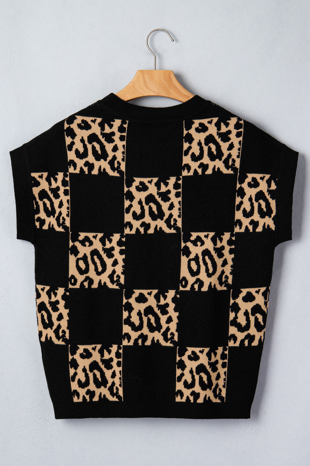 Black leopard checkerboard short sleeve knit sweater by Dear-Lover Dropshipping, featuring a stylish pattern and comfortable viscose blend.