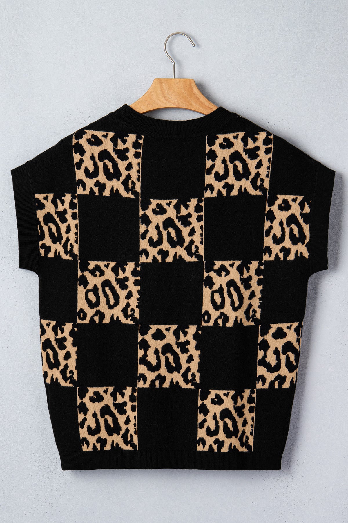 Black leopard checkerboard short sleeve knit sweater by Dear-Lover Dropshipping, featuring a stylish pattern and comfortable viscose blend.