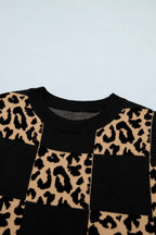 Black leopard checkerboard short sleeve knit sweater by Dear-Lover Dropshipping, featuring a stylish pattern and comfortable fabric blend.