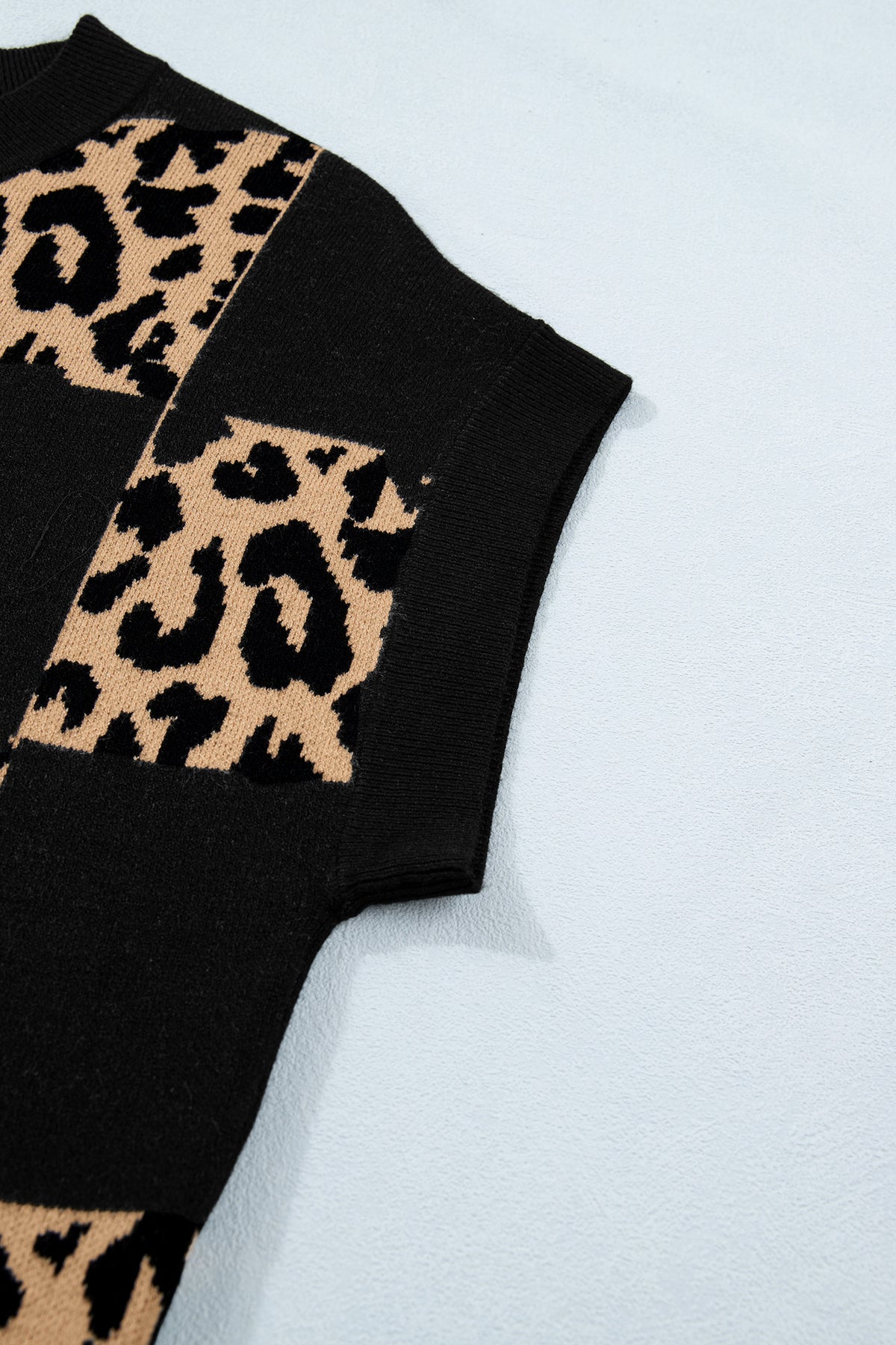 Black Leopard Checkerboard Short Sleeve Knit Sweater by Dear-Lover, featuring a stylish short sleeve design with leopard print.