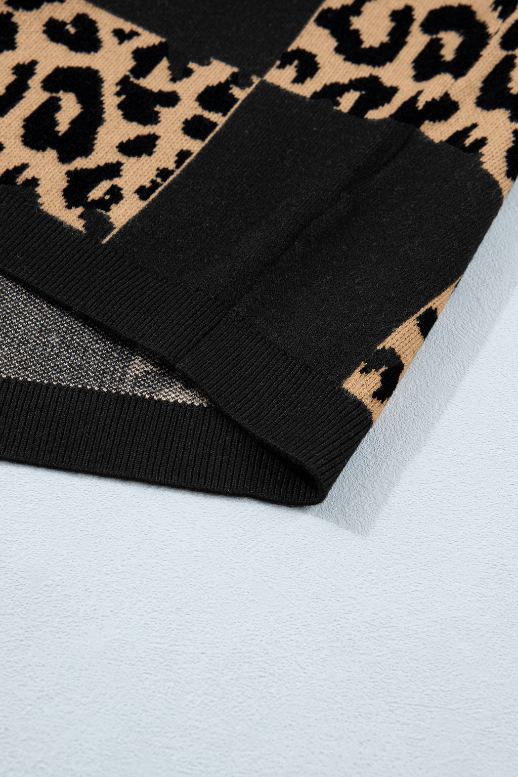 Black leopard checkerboard short sleeve knit sweater from Dear-Lover, featuring a stylish pattern and comfortable viscose blend fabric.