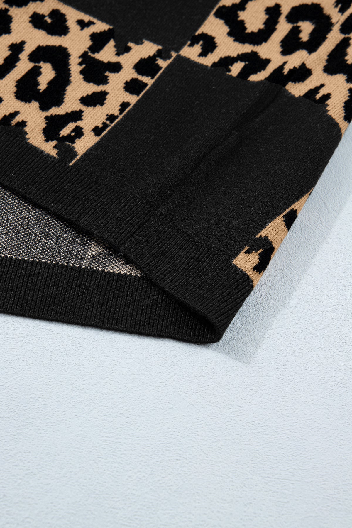 Black leopard checkerboard short sleeve knit sweater from Dear-Lover, featuring a stylish pattern and comfortable viscose blend fabric.