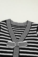 Black stripe short sleeve knit sweater with V-neck and bow knot detail from Dear-Lover, made of cotton and acrylic.