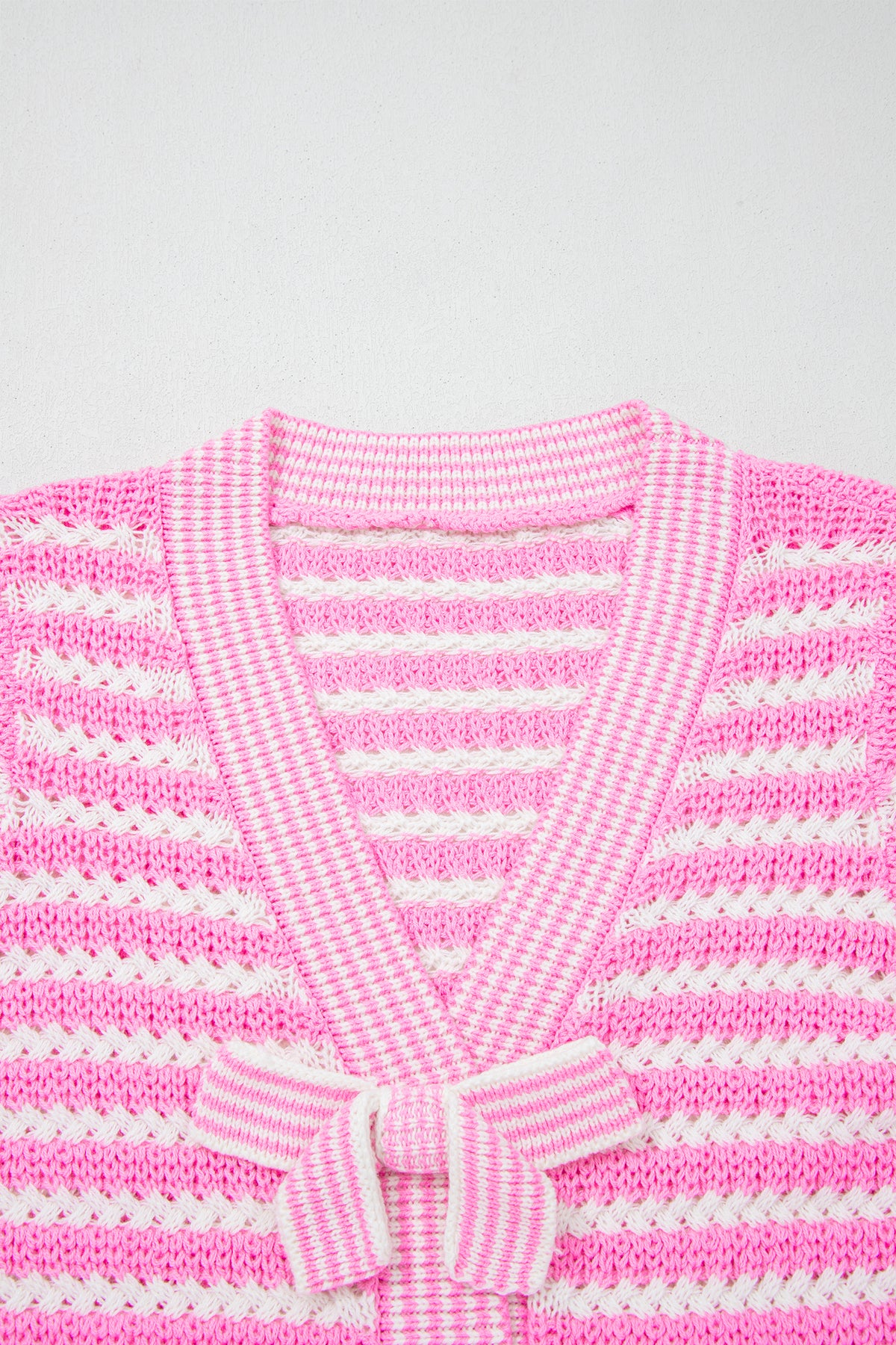 Black stripe short sleeve knit sweater with V-neck and bow knot detail, by Dear-Lover Dropshipping, made of cotton and acrylic.