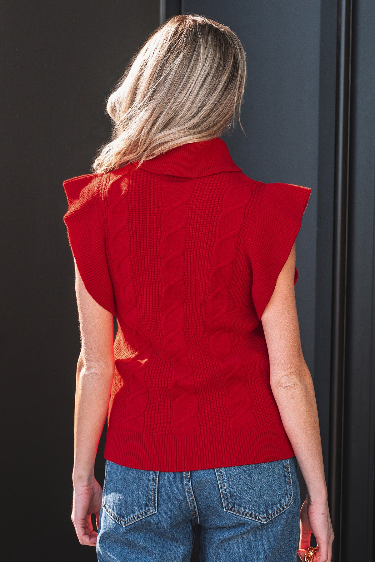 Dear-Lover Jet Stream Cable Knit Turtleneck Sweater with ruffled short sleeves, made of viscose, polyester, and polyamide.