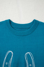 Light blue horse shoe embroidered loose short sleeve sweater from Dear-Lover, made of viscose, polyester, and polyamide.