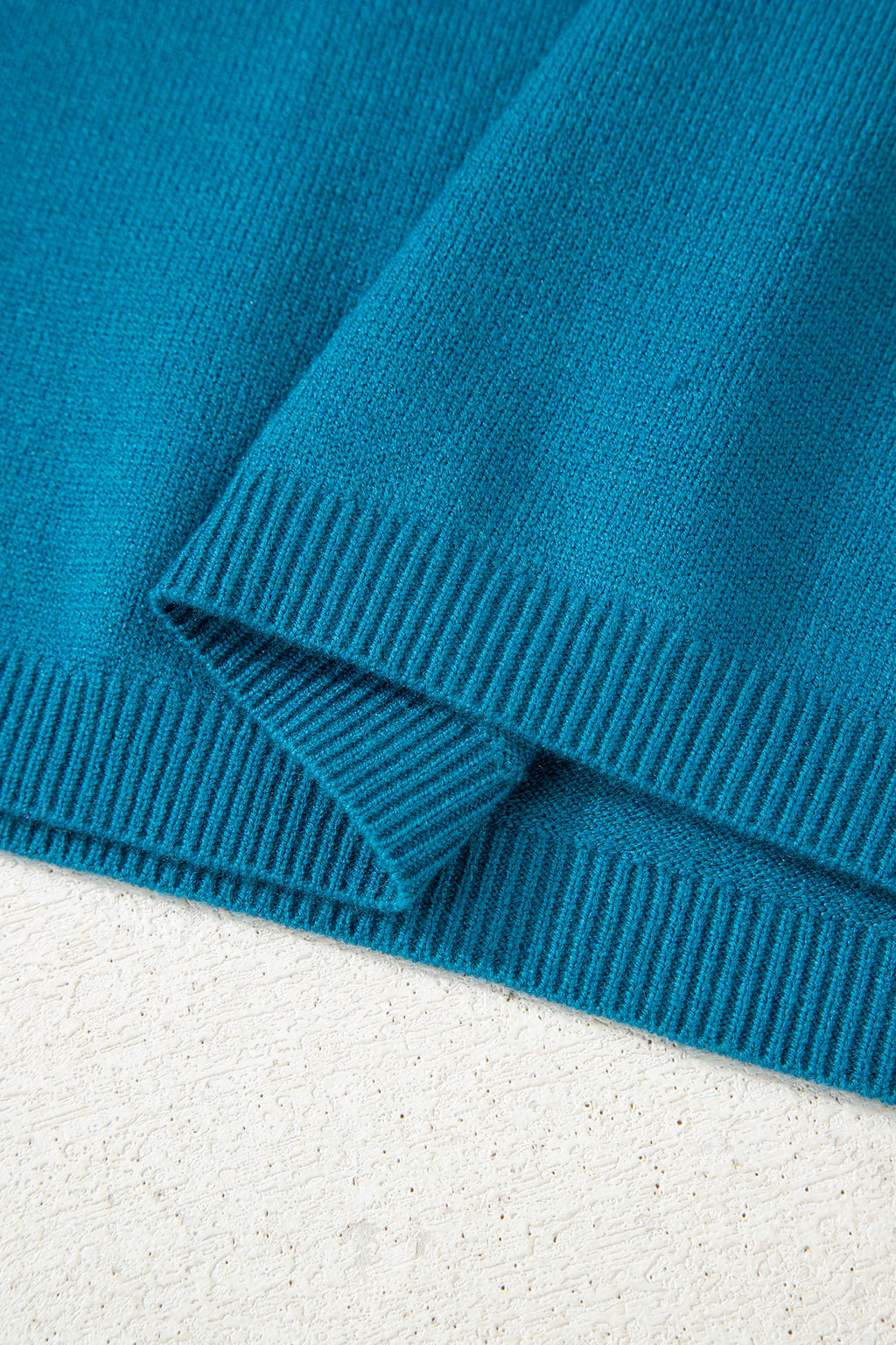 Light blue short sleeve sweater with horse shoe embroidery by Dear-Lover, made of viscose, polyester, and polyamide, loose fit.
