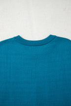 Light blue Dear-Lover horse shoe embroidered loose short sleeve sweater, made of viscose, polyester, and polyamide fabric.
