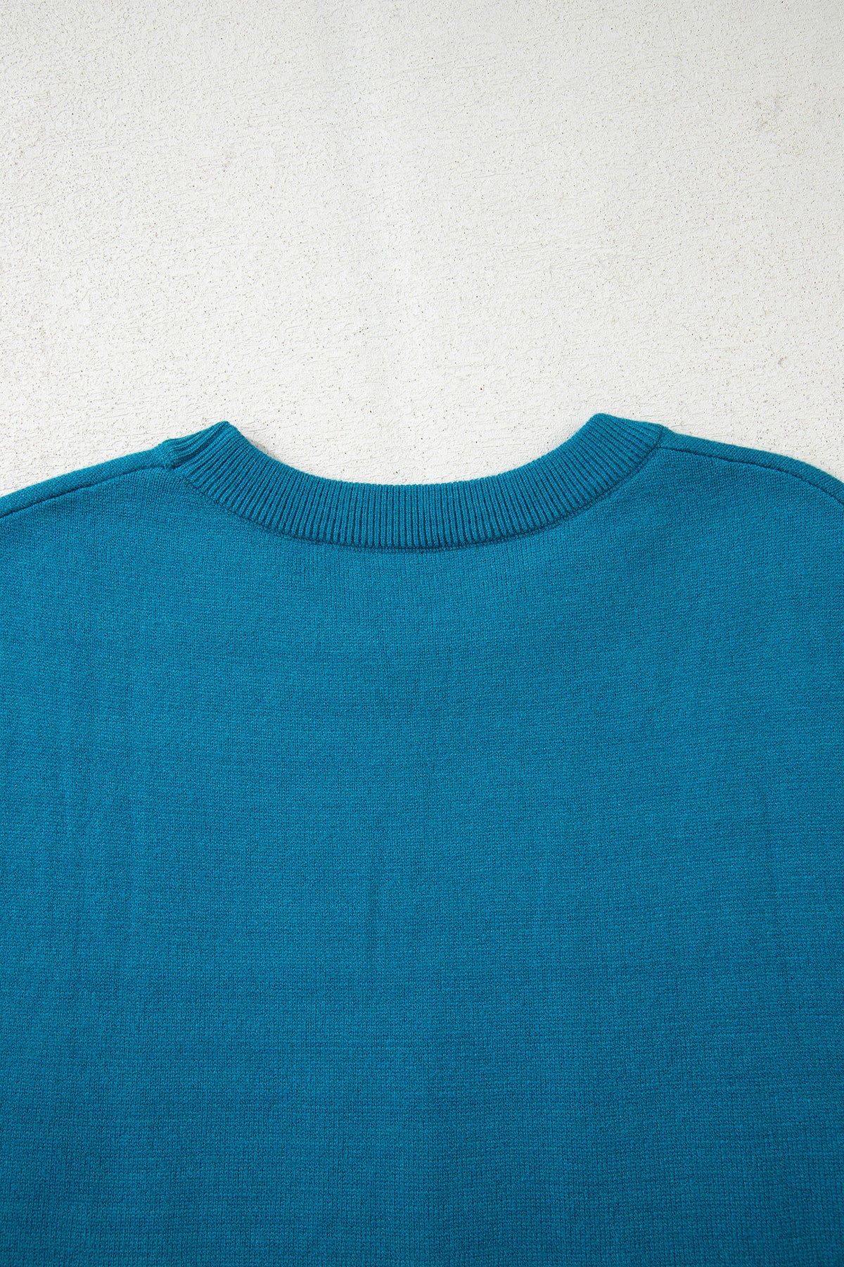 Light blue Dear-Lover horse shoe embroidered loose short sleeve sweater, made of viscose, polyester, and polyamide fabric.