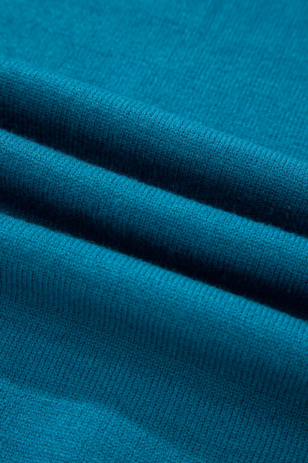 Light blue Dear-Lover horse shoe embroidered short sleeve sweater, loose fit, made of viscose, polyester, and polyamide fabric.
