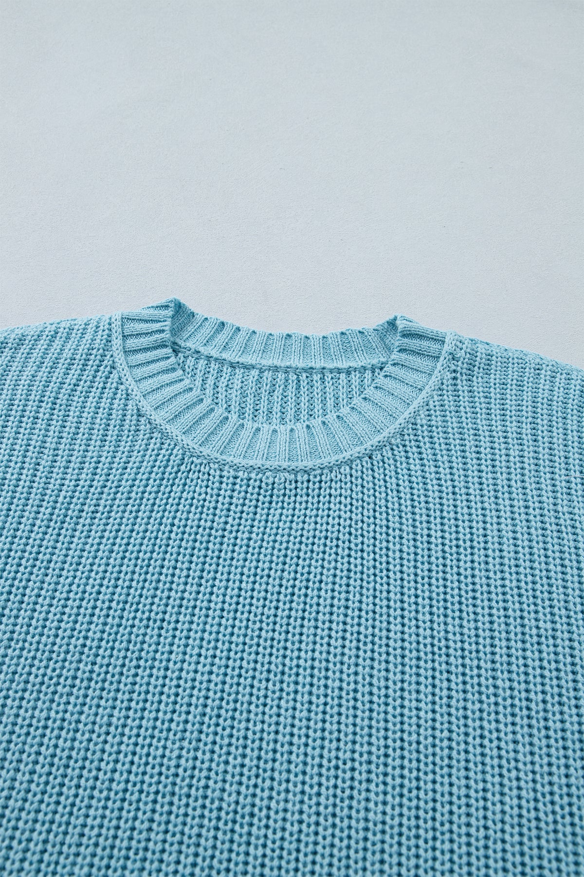 Mist blue Dear-Lover loose half sleeve sweater with exposed seam detail, made of cotton and acrylic, designed for a relaxed fit.