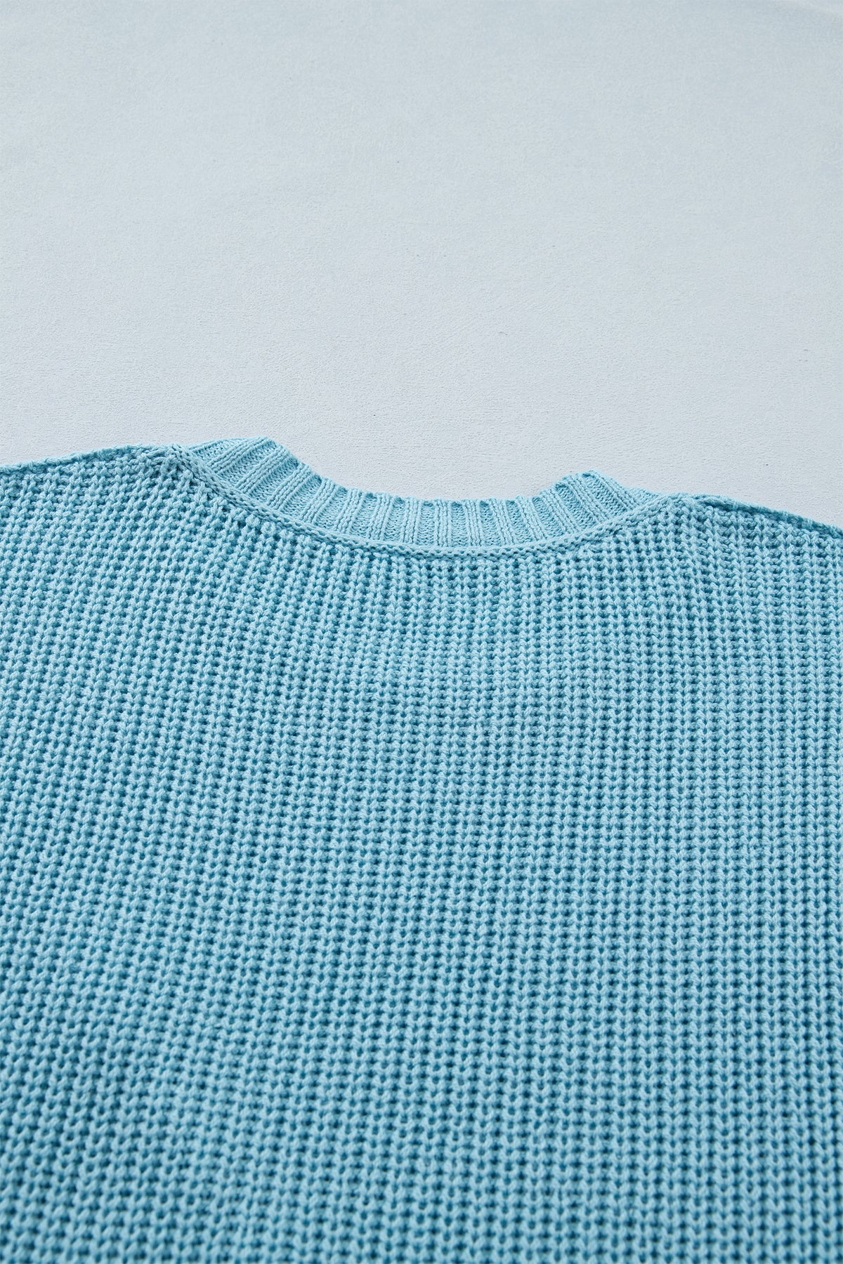 Mist blue Dear-Lover short sleeve sweater with exposed seam detail, loose fit, made of cotton and acrylic blend.