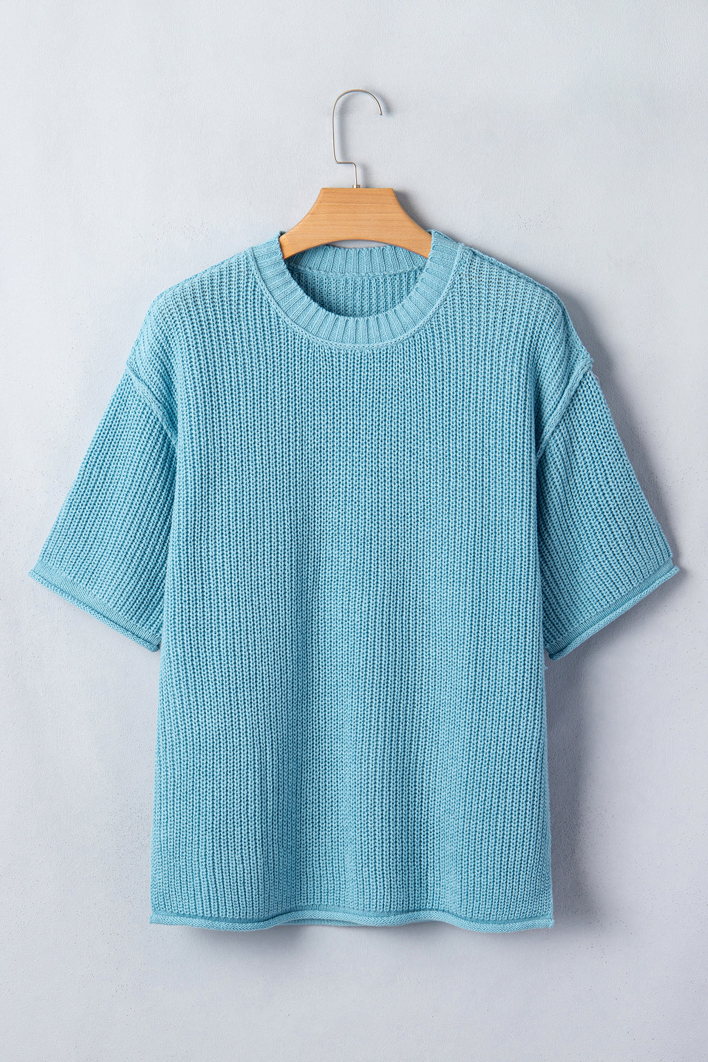 Mist blue Dear-Lover short sleeve sweater with exposed seam detail, loose fit, cotton and acrylic blend, casual and comfortable style.