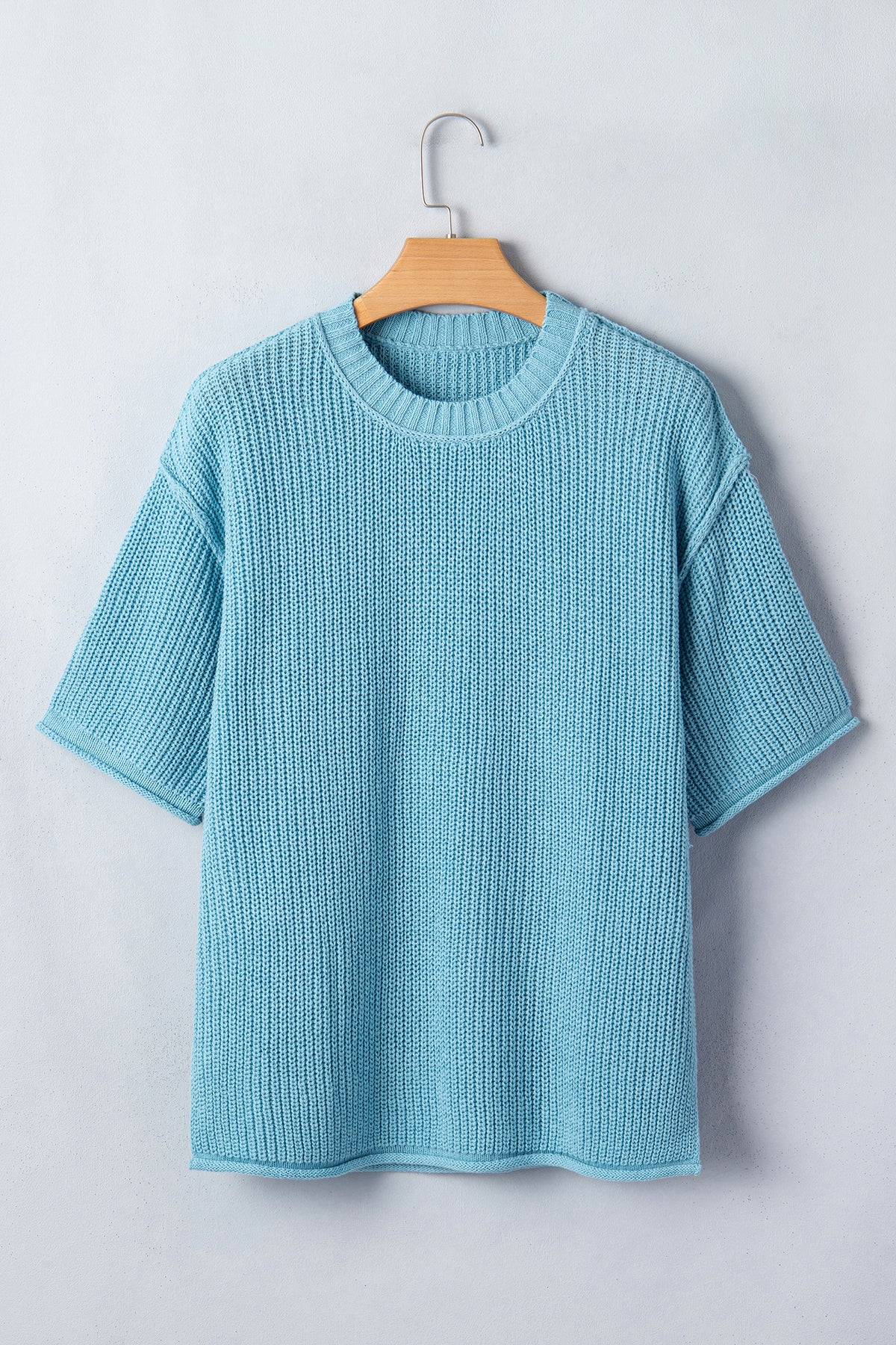 Mist blue Dear-Lover short sleeve sweater with exposed seam detail, loose fit, cotton and acrylic blend, casual and comfortable style.