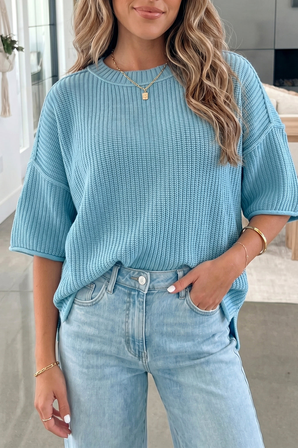 Mist Blue Dear-Lover short sleeve sweater with exposed seam detail, loose fit, made of cotton and acrylic blend, ideal for casual wear.