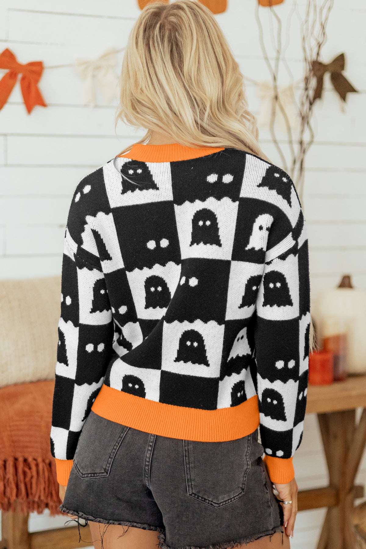 Black high-neck drop shoulder sweater with geometric print by Dear-Lover, made of viscose, polyester, and polyamide.