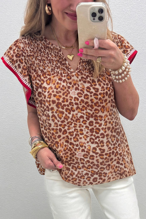 Apricot leopard blouse by Dear-Lover with contrast trim, ruffled short sleeves, made from lightweight viscose fabric.