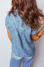 Dear-Lover Blue Star Print Denim Shirt with double chest pockets, short sleeves, made of 95% cotton and 5% elastane.