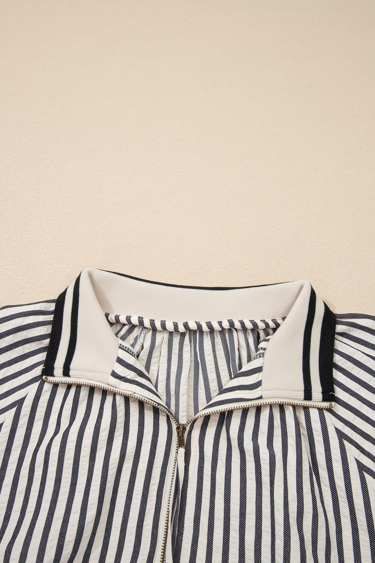 Black stripe polo collar blouse with half-zip, short puff sleeves, made from polyester and viscose by Dear-Lover.