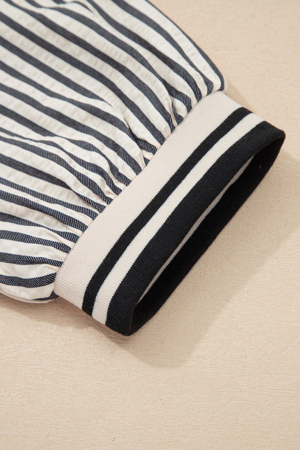 Black stripe polo collar blouse with half-zip, short puff sleeves, made of polyester and viscose, by Dear-Lover Dropshipping.
