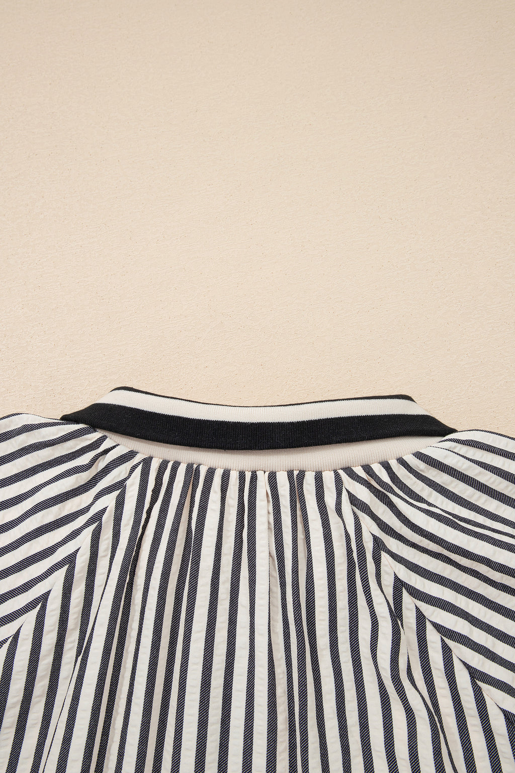 Black stripe polo collar blouse with half-zip, short puff sleeves, made of polyester and viscose, by Dear-Lover for stylish tops.