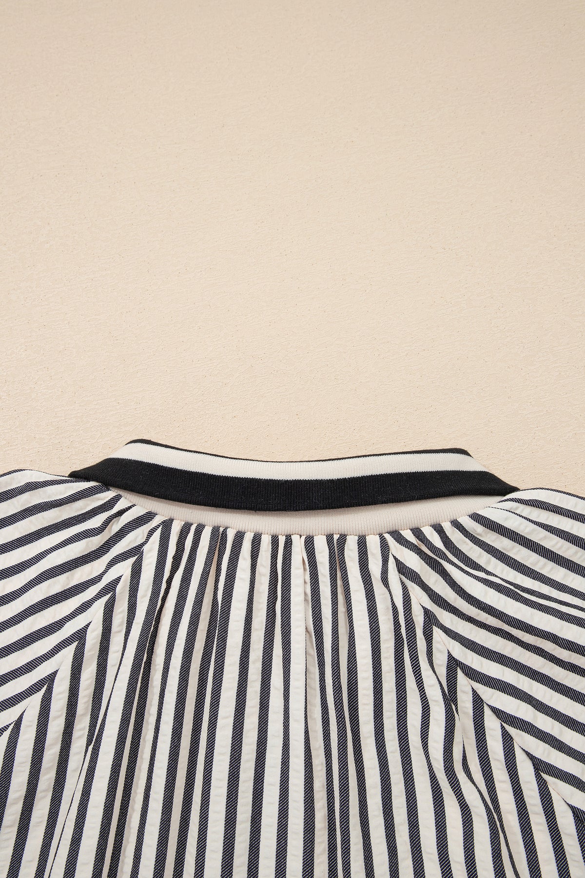 Black stripe polo collar blouse with half-zip, short puff sleeves, made of polyester and viscose, by Dear-Lover for stylish tops.