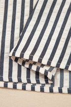 Black stripe polo collar blouse with half-zip, short puff sleeves, made of polyester and viscose, from Dear-Lover.