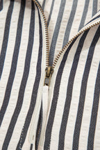 Black stripe polo collar blouse by Dear-Lover with half-zip, short puff sleeves, made of polyester and viscose fabric.