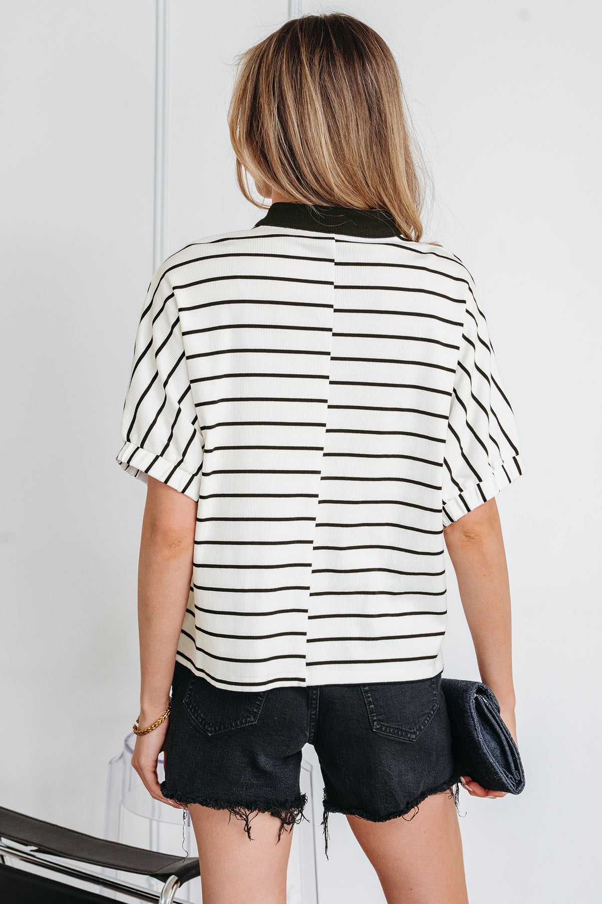 Black Stripe Dolman Top with stand collar, V-neck, elastic cuffs, and half sleeves, made of cotton and elastane.