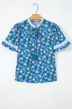 Blue floral print blouse by Dear-Lover with button closure, tie neck, striped detail, short sleeves, made from 100% cotton.