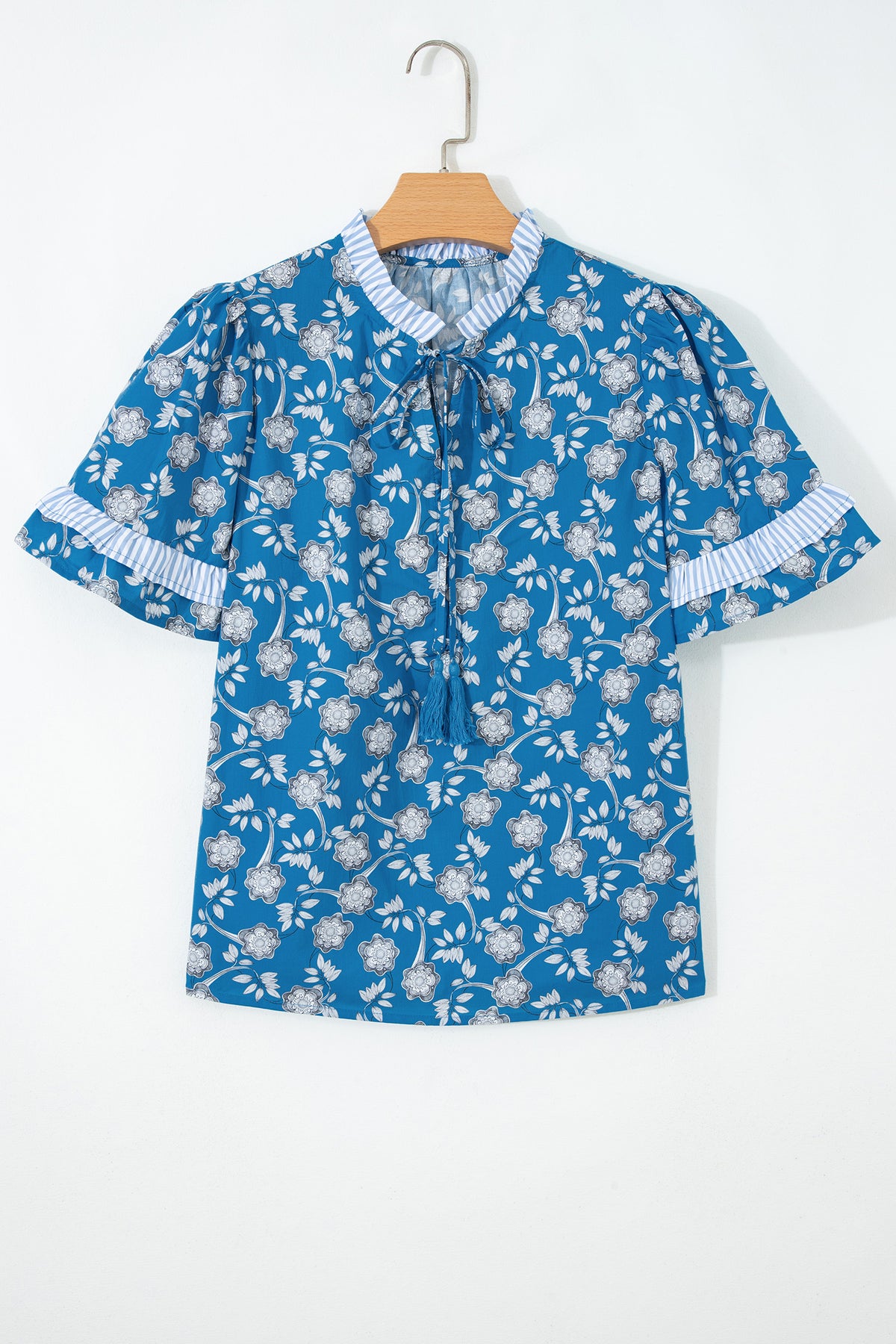 Blue floral print blouse by Dear-Lover with button closure, tie neck, striped detail, short sleeves, made from 100% cotton.