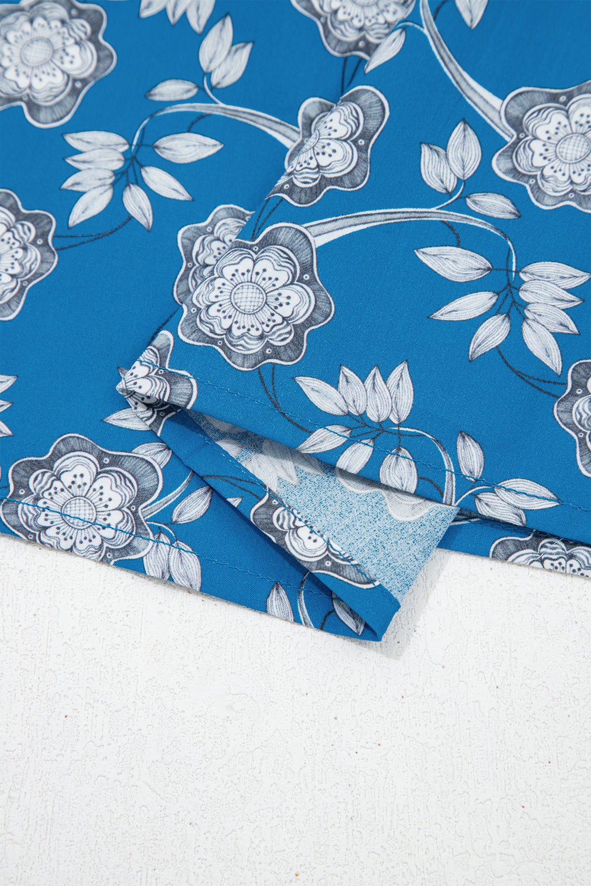 Dear-Lover blue floral print short sleeve blouse with tie neck and striped detail, made of 100% cotton, stylish and comfortable.