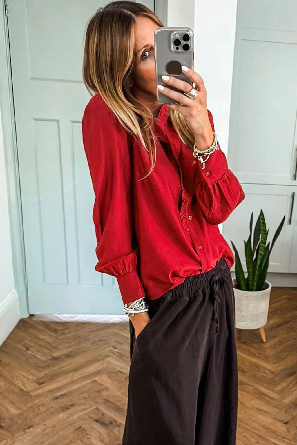 Fiery red pleated long sleeve blouse with frilled trim and button-up front, made of polyester, by Dear-Lover.