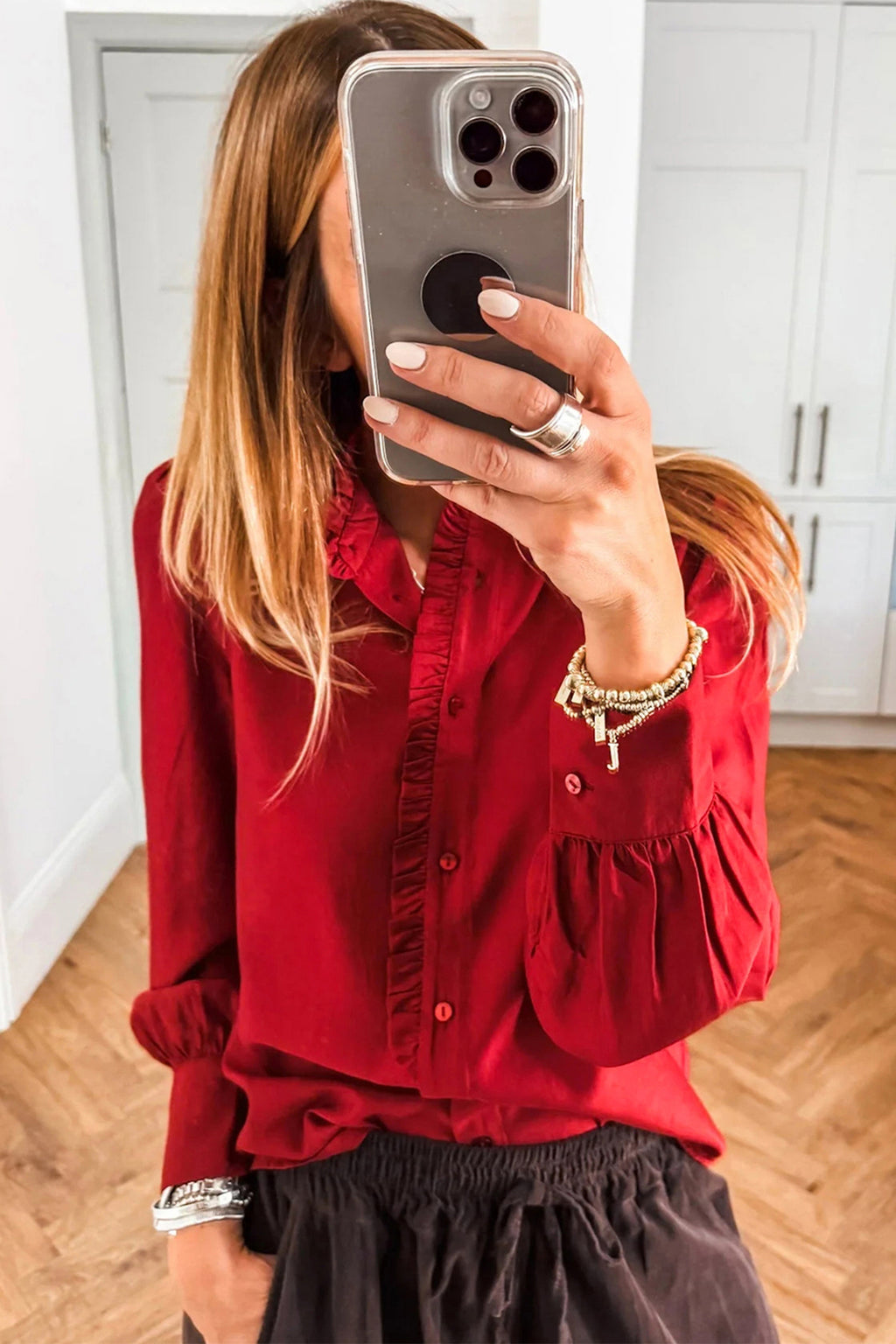 Fiery red long sleeve blouse with frilled trim, button-up front, and pleated design by Dear-Lover, made of lightweight polyester fabric.
