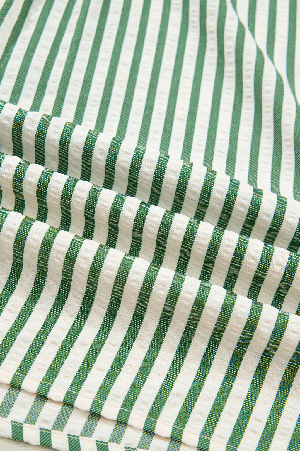 Green stripe collared split neck blouse with short bubble sleeves by Dear-Lover Dropshipping, made of polyester and viscose fabric.