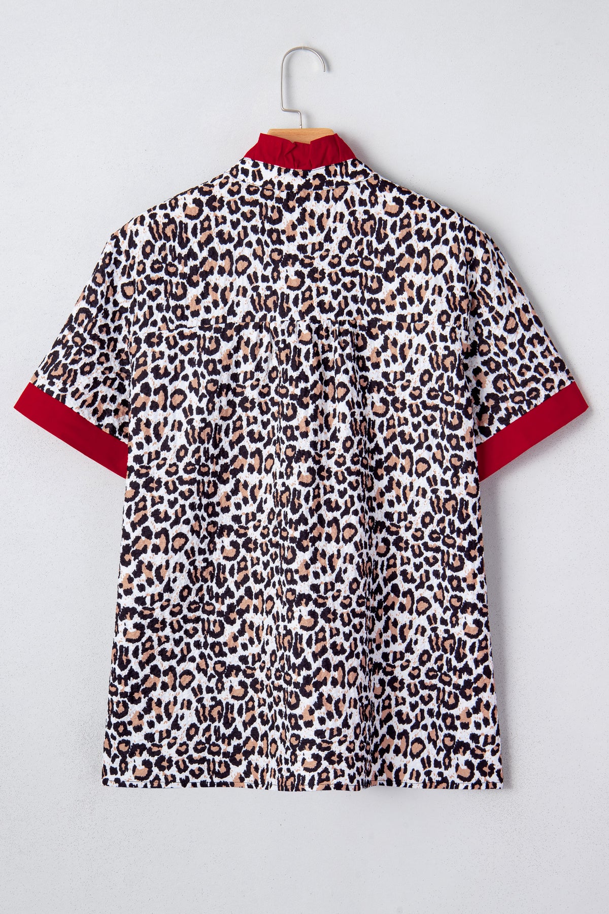 Khaki leopard print blouse with frilled V-neck trim from Dear-Lover, featuring contrast details, made of polyester fabric.