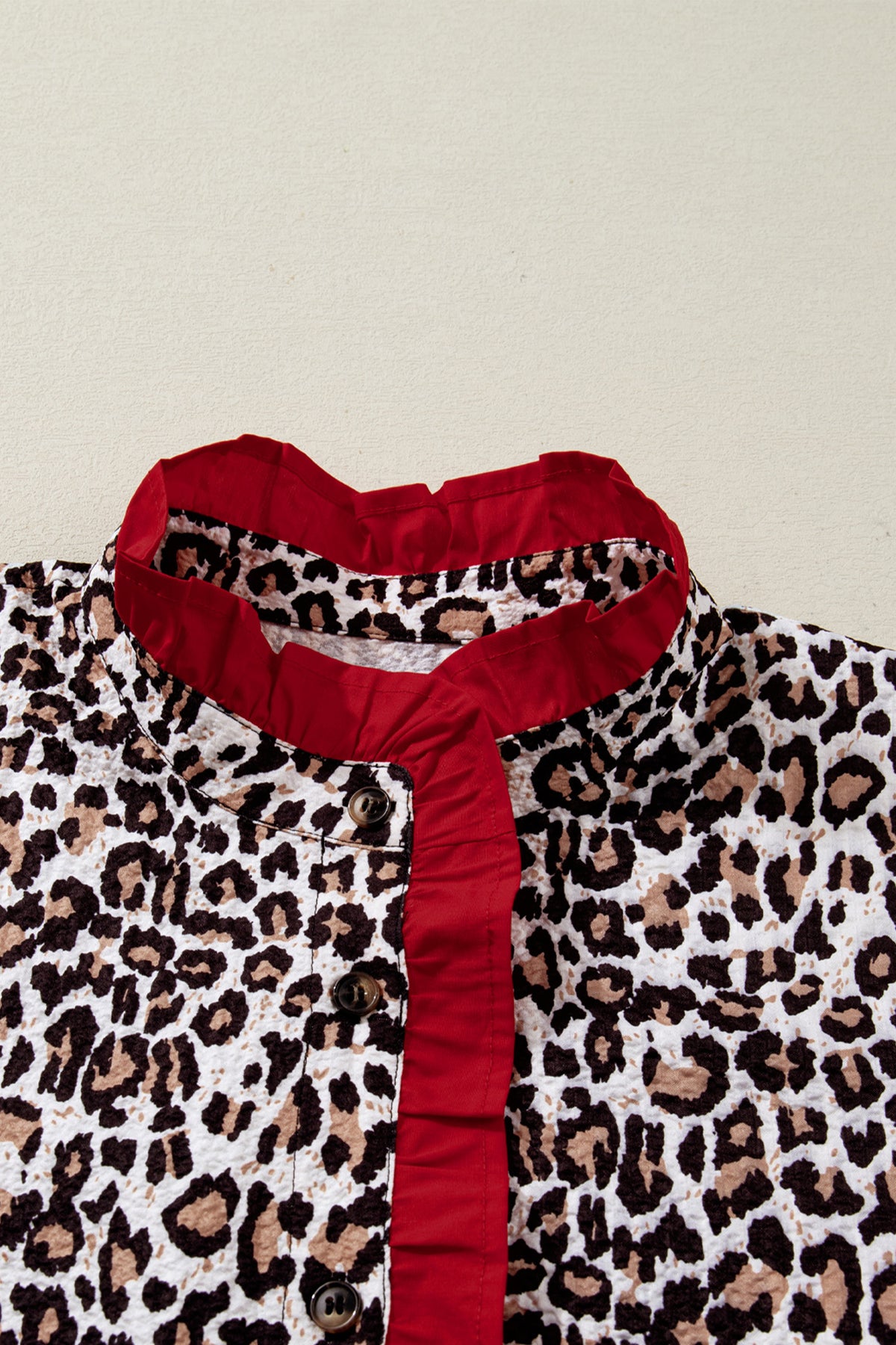 Khaki leopard print blouse with contrast frilled V-neck trim from Dear-Lover, featuring long sleeves and stylish design.
