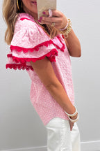 Pink Dear-Lover blouse with eyelet embroidery, floral texture, contrast lace trim, and flutter sleeves.