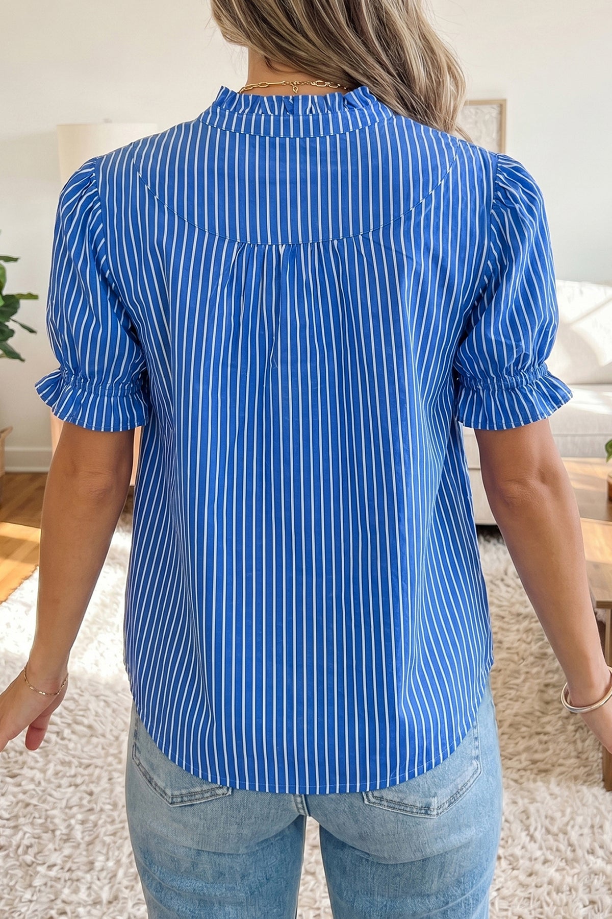 Red stripe ruffled short puff sleeve blouse from Dear-Lover with button front and lightweight cotton-viscose fabric.