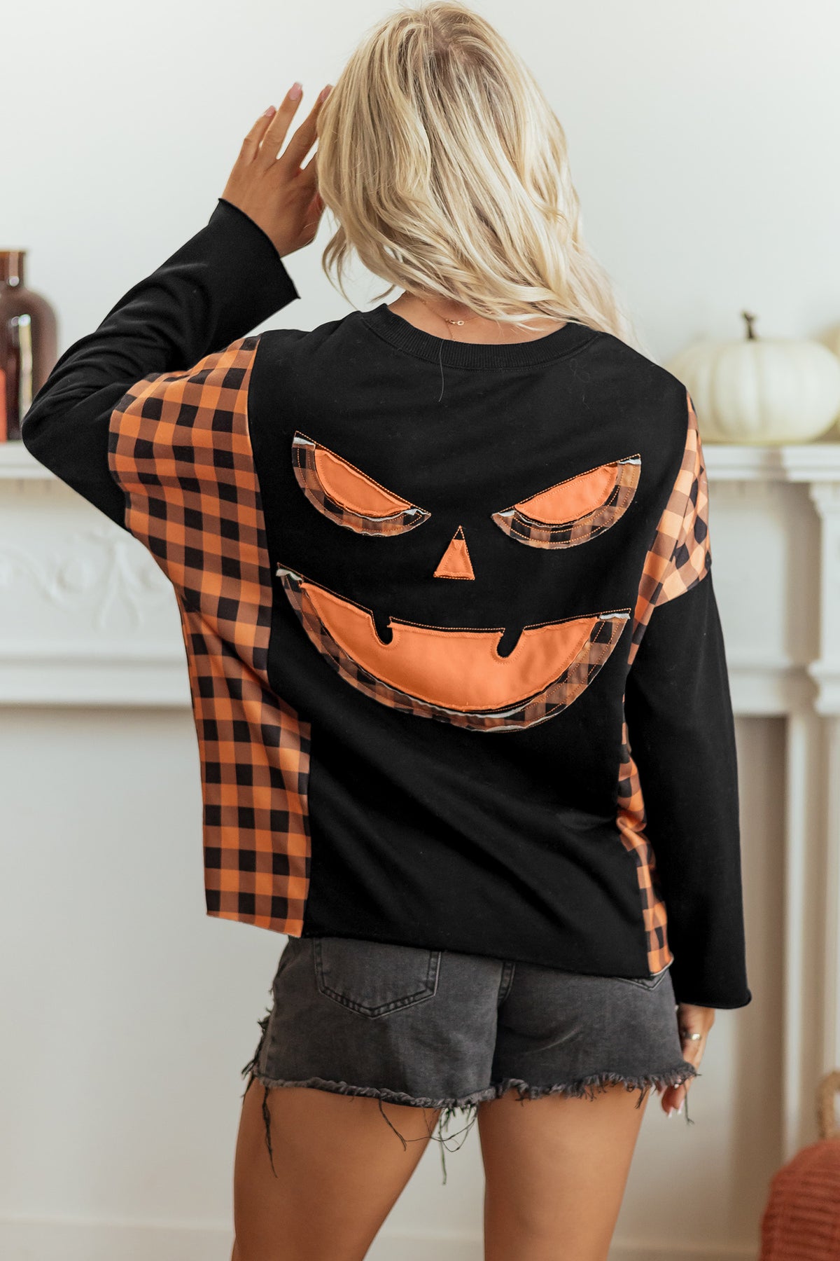 Black patchwork plaid long sleeve top with pumpkin face design from Dear-Lover Dropshipping, featuring a casual, stylish look.