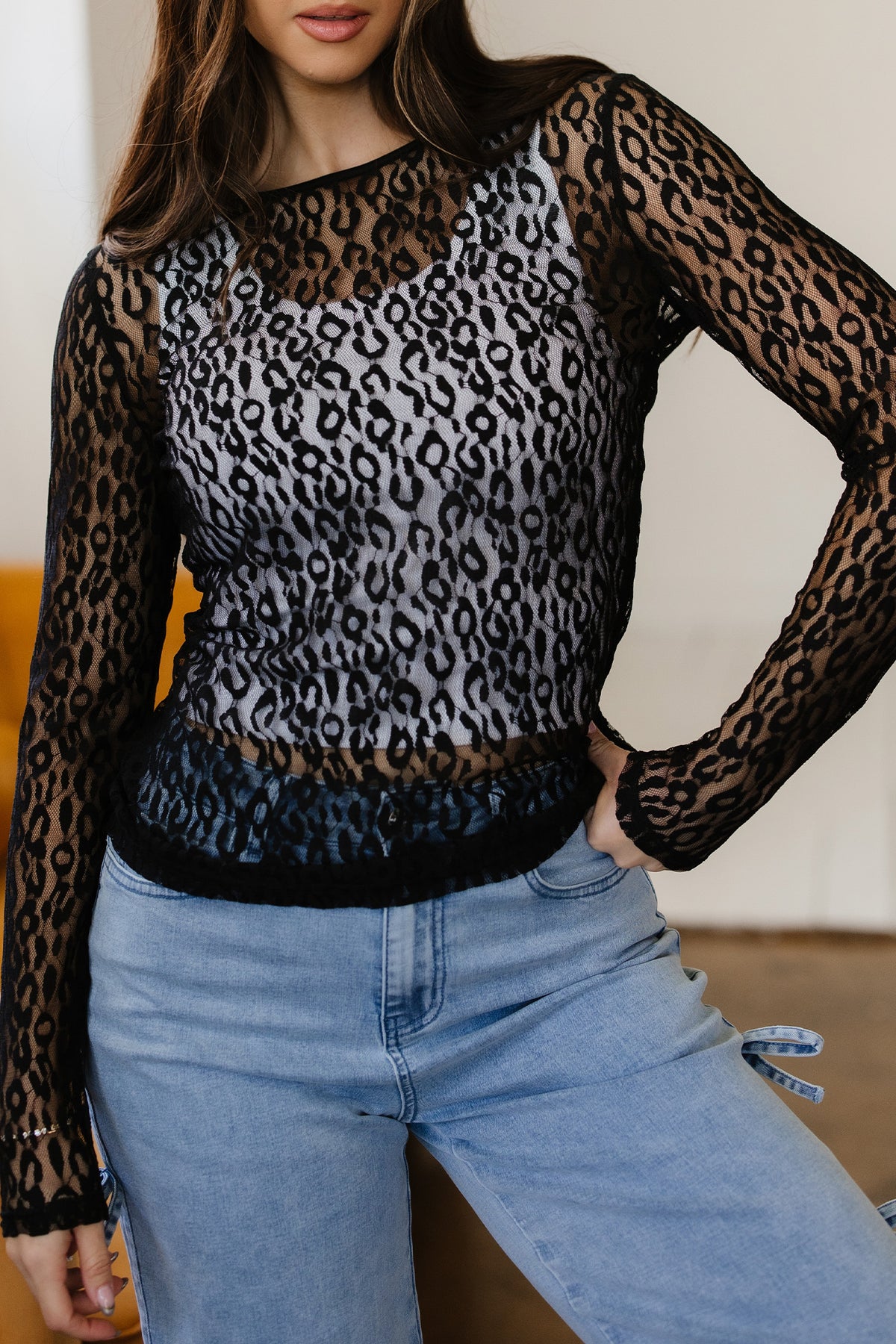 Black leopard pattern sheer mesh long sleeve top from Dear-Lover, featuring a fitted design and see-through fabric.