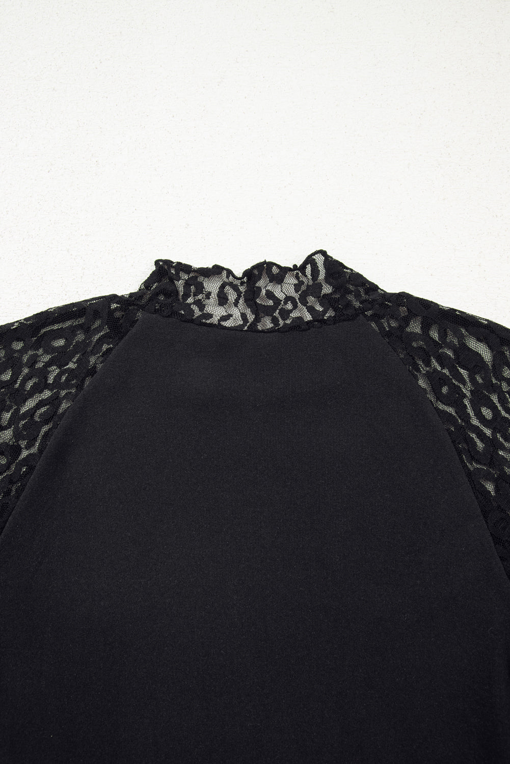 Black Leopard Mesh Patchwork Knit Long Sleeve Top by Dear-Lover, featuring a stylish leopard print and breathable mesh fabric.