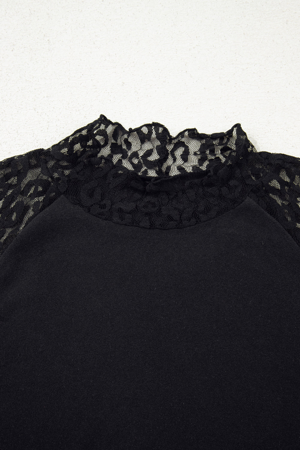Black leopard mesh patchwork knit long sleeve top from Dear-Lover featuring a fitted design and contrasting patchwork details.
