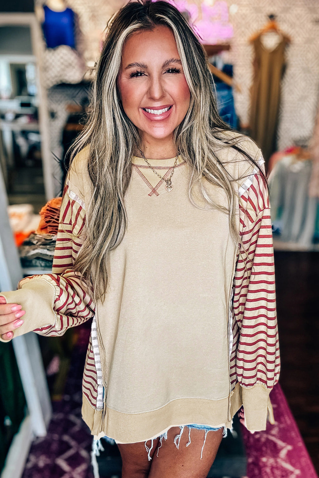 Black stripe sleeve patchwork casual knit top by Dear-Lover, long sleeve design with mixed polyester, cotton, and elastane fabric.