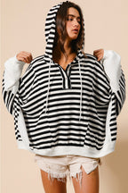 Black and white oversized striped Henley hooded top with dolman sleeves, made by Dear-Lover, featuring buttons and long sleeve design.