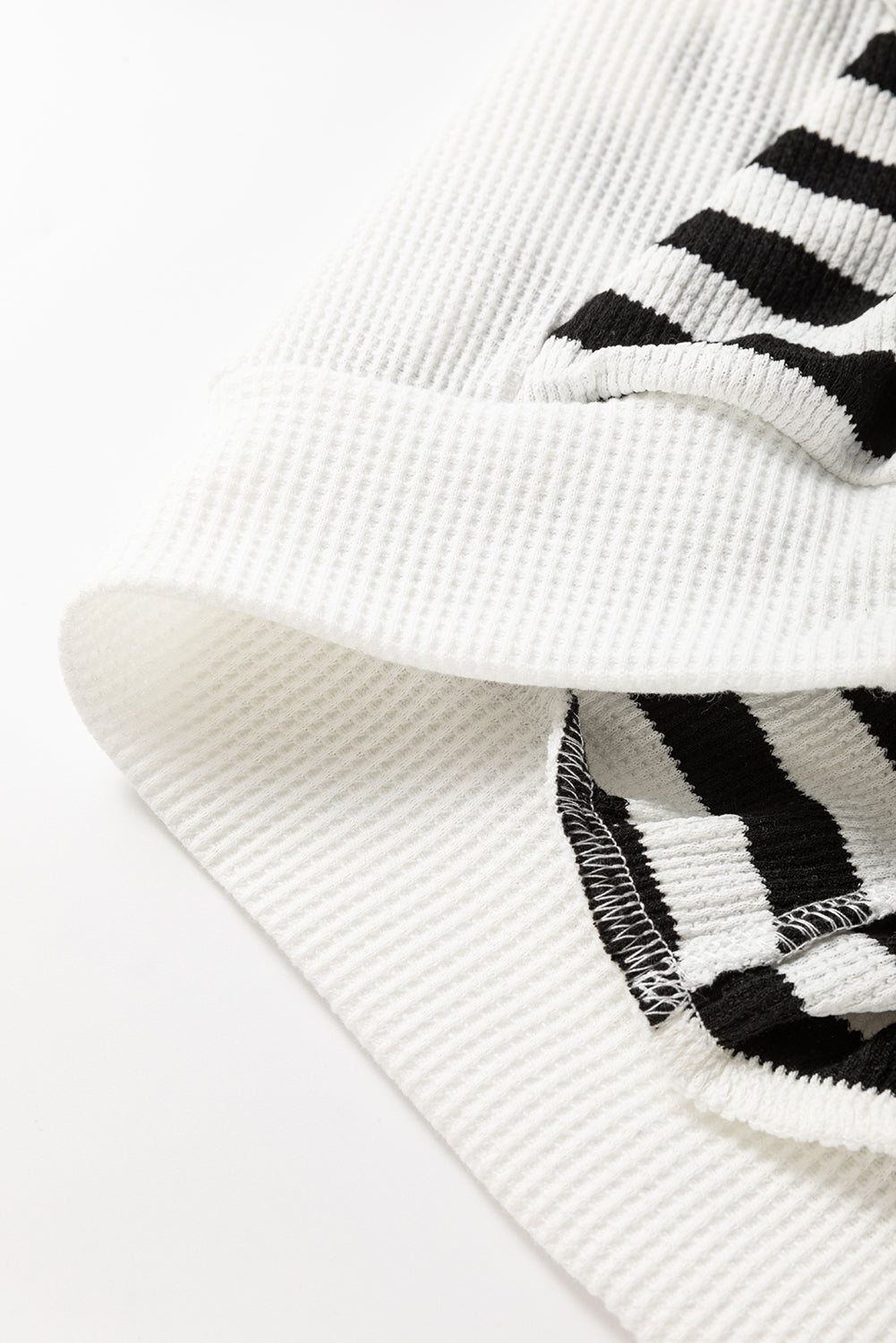 Black and white oversized striped Henley hooded top with dolman sleeves, made of polyester and elastane, from Dear-Lover.